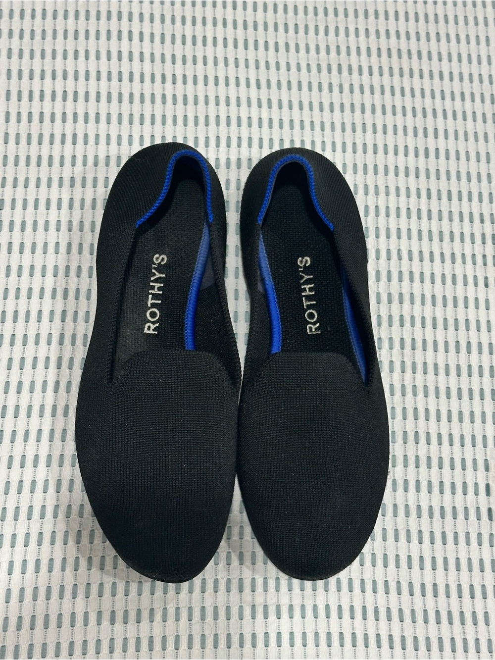 Rothy's Black Flats with Blue Trim
